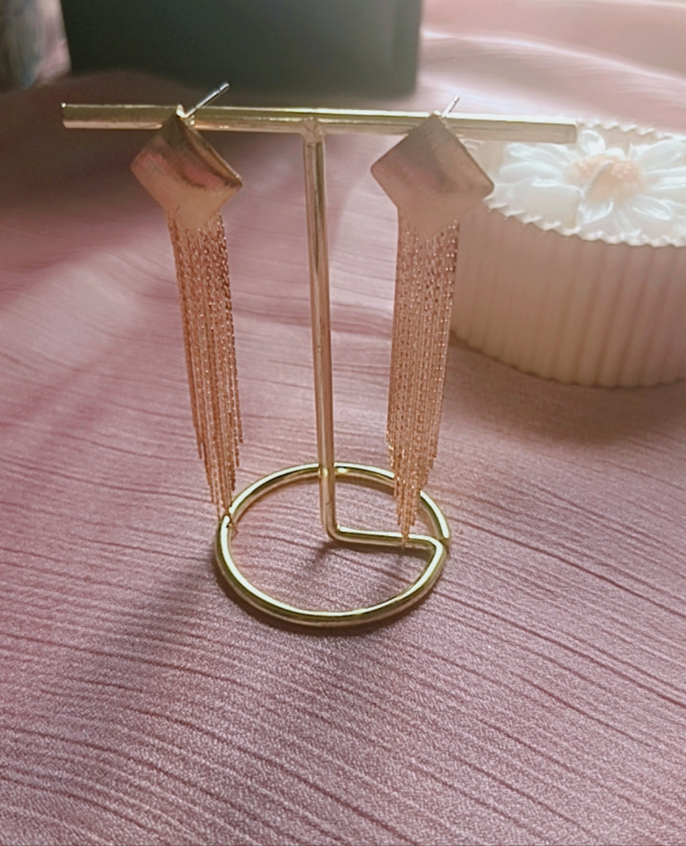 Gold toned tassel earing