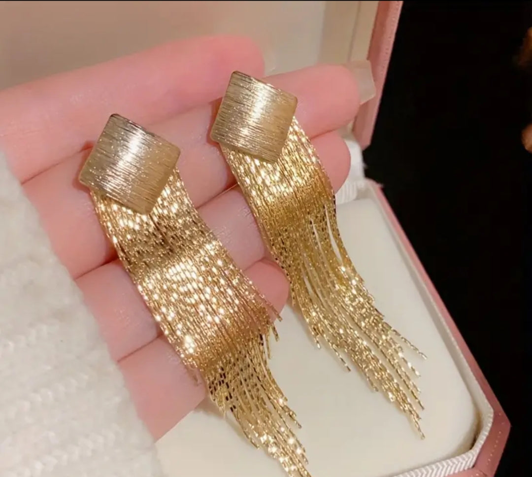 Gold toned tassel earing