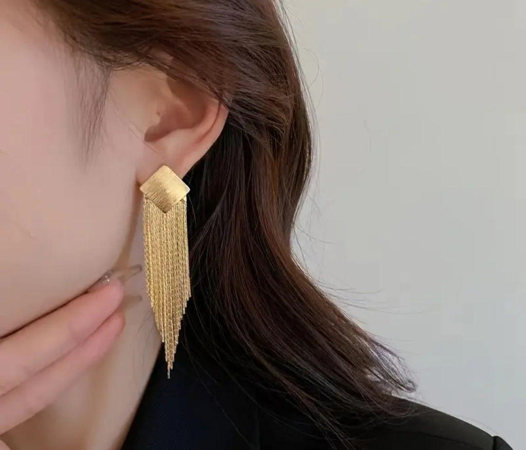 Gold toned tassel earing