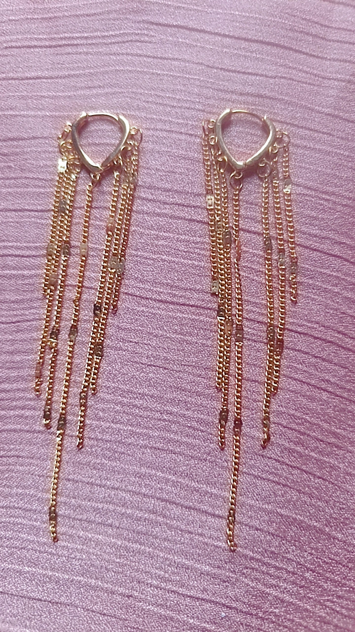Long gold-toned fringe earring