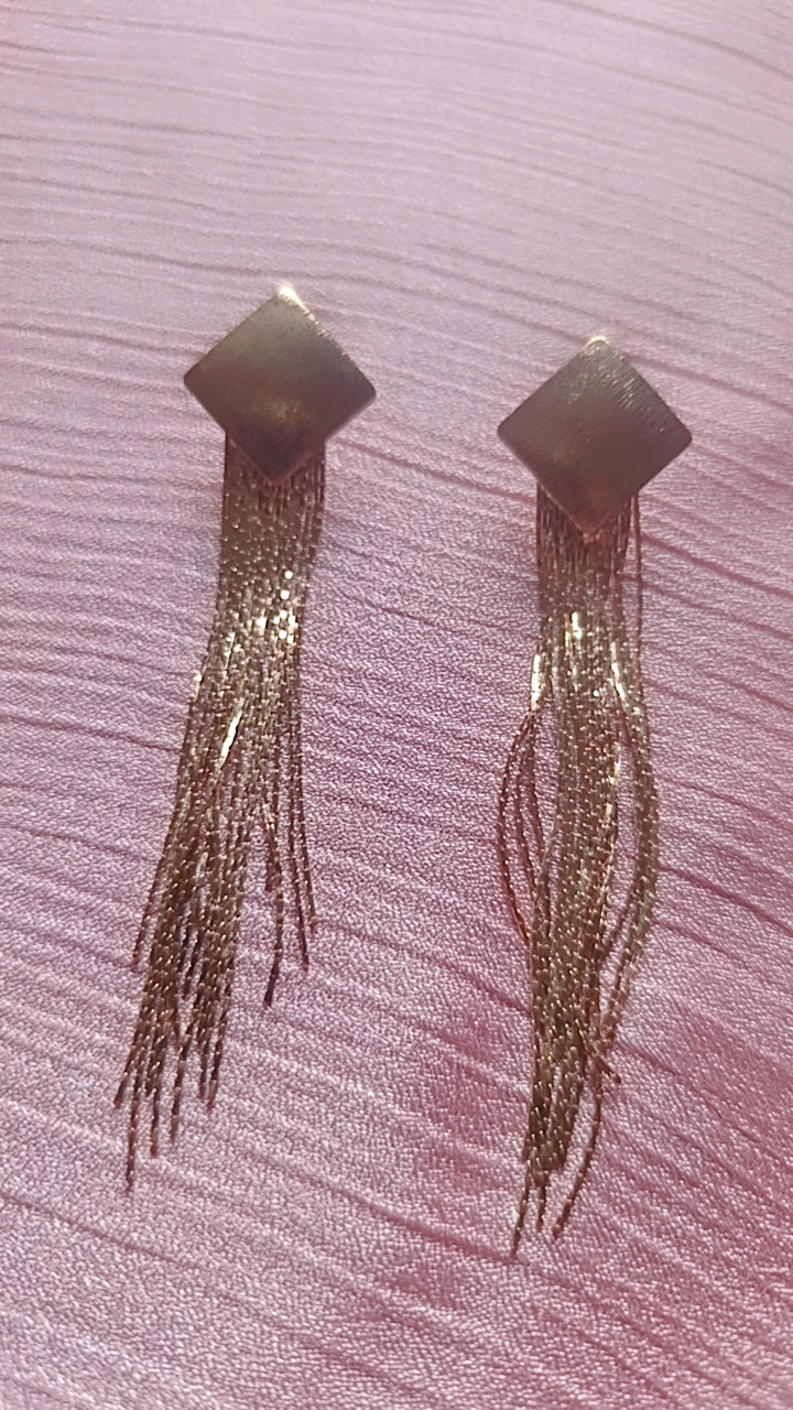 Gold toned tassel earing
