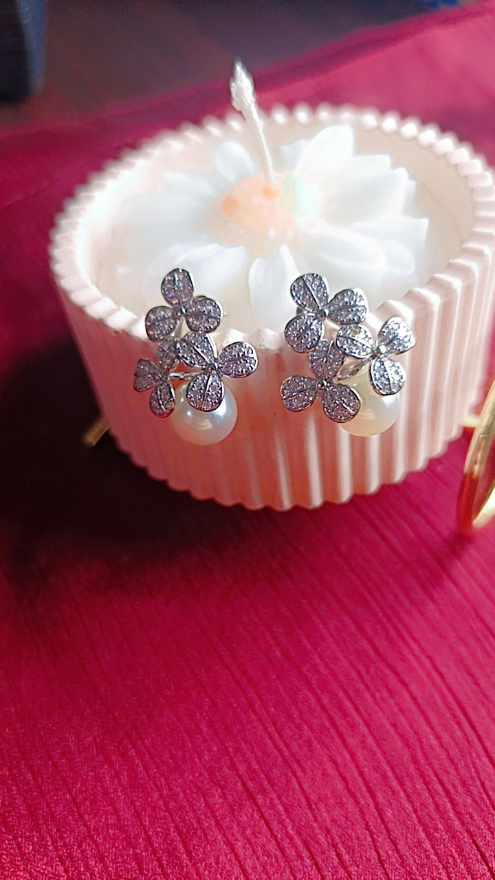 silver-toned stud earrings